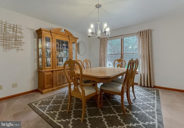 41920 Clover Hill Ct, Hollywood, MD 20636 - dining room featuring a chandelier, carpet, and baseboards