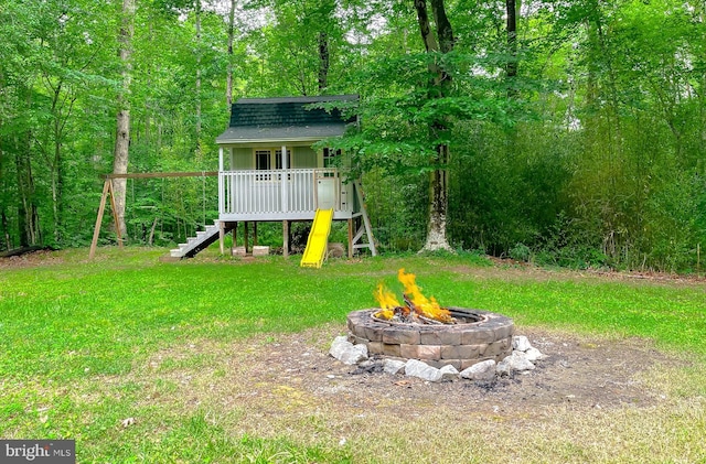 41920 Clover Hill Ct, Hollywood, MD 20636 - view of grassy yard featuring an outdoor fire pit, stairs, and a view of trees