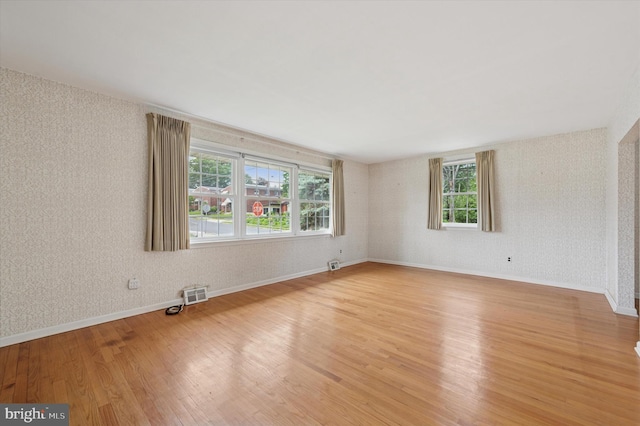 167 Eldon Ave, Lansdowne, PA 19050 - unfurnished room featuring light wood finished floors, plenty of natural light, and baseboards