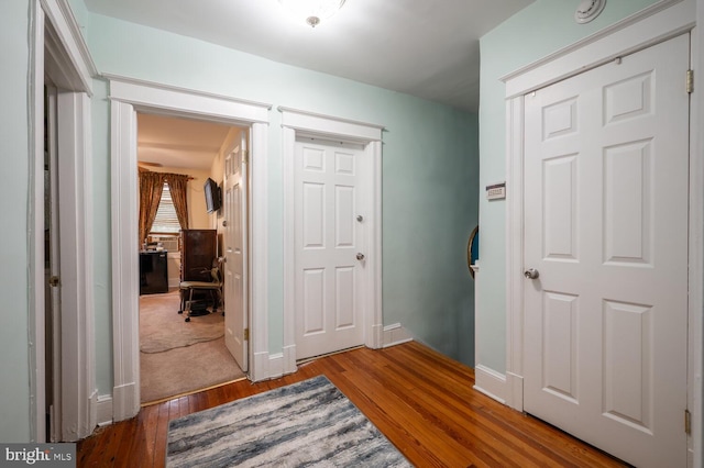 4800 Illinois Ave NW, Washington, DC 20011 - corridor featuring wood finished floors and baseboards