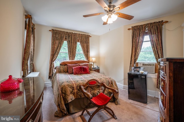 4800 Illinois Ave NW, Washington, DC 20011 - carpeted bedroom with multiple windows, baseboards, cooling unit, and a ceiling fan