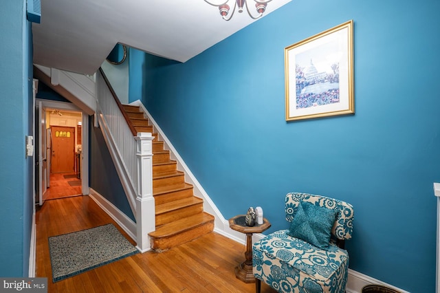4800 Illinois Ave NW, Washington, DC 20011 - staircase featuring wood finished floors and baseboards