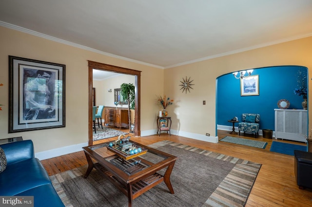 4800 Illinois Ave NW, Washington, DC 20011 - living area with crown molding, a chandelier, wood finished floors, and baseboards