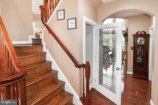 13763 Deacons Way, Gainesville, VA 20155 - foyer entrance featuring stairway, arched walkways, wood finished floors, and baseboards