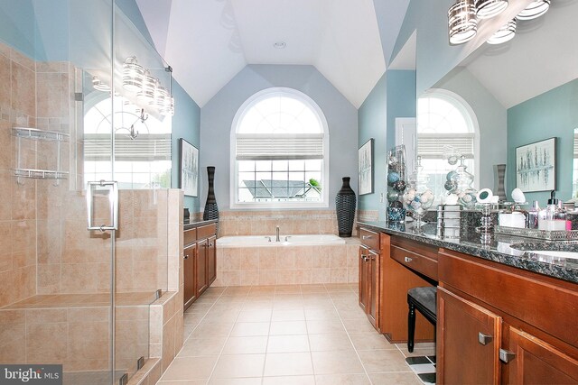 13763 Deacons Way, Gainesville, VA 20155 - bathroom featuring a garden tub, vanity, a stall shower, lofted ceiling, and tile patterned floors