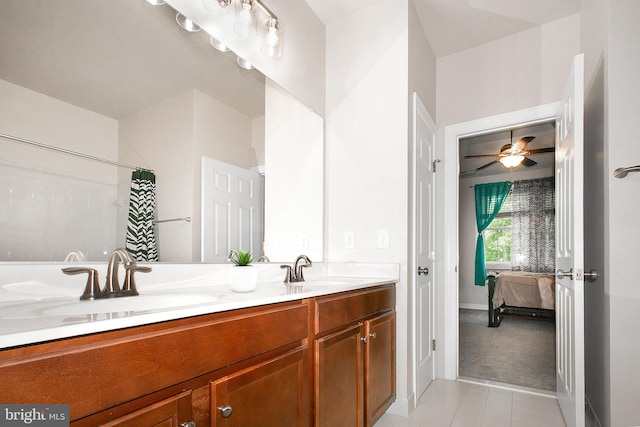 13763 Deacons Way, Gainesville, VA 20155 - ensuite bathroom featuring double vanity, tile patterned floors, ceiling fan, and baseboards
