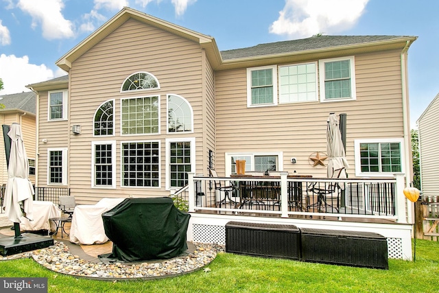 13763 Deacons Way, Gainesville, VA 20155 - rear view of house with a wooden deck and a yard