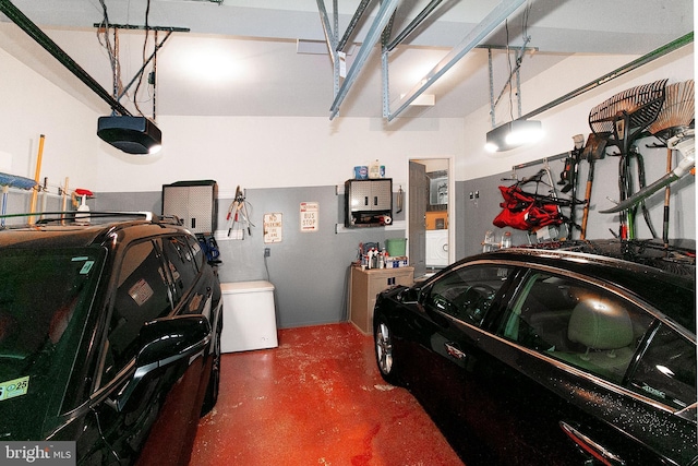 13763 Deacons Way, Gainesville, VA 20155 - garage featuring a garage door opener