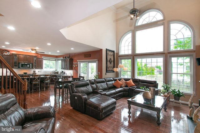 13763 Deacons Way, Gainesville, VA 20155 - living area with ceiling fan, recessed lighting, dark wood-type flooring, a towering ceiling, and crown molding