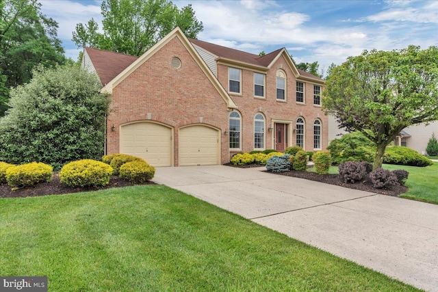 3026 5th St S, Voorhees, NJ 08043 - view of front of house featuring brick siding, concrete driveway, and a front yard