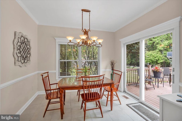 3026 5th St S, Voorhees, NJ 08043 - dining space with a chandelier, baseboards, crown molding, and light tile patterned floors