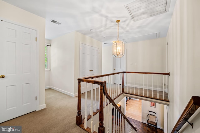 5702 Ainsley Garth, Baltimore, MD 21212 - corridor featuring an upstairs landing, attic access, and carpet