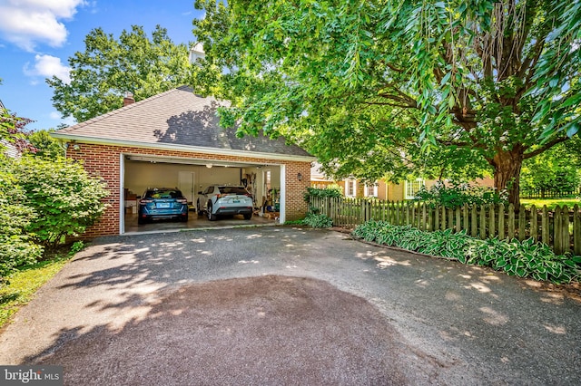 5702 Ainsley Garth, Baltimore, MD 21212 - garage featuring asphalt driveway