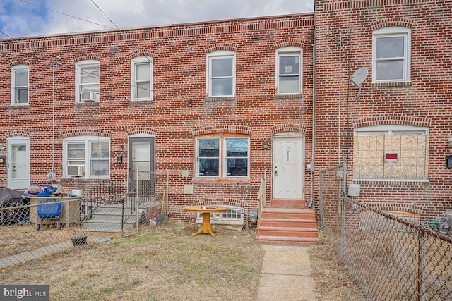 2933 Royden St, Camden, NJ 08105 - view of property featuring brick siding, cooling unit, and entry steps