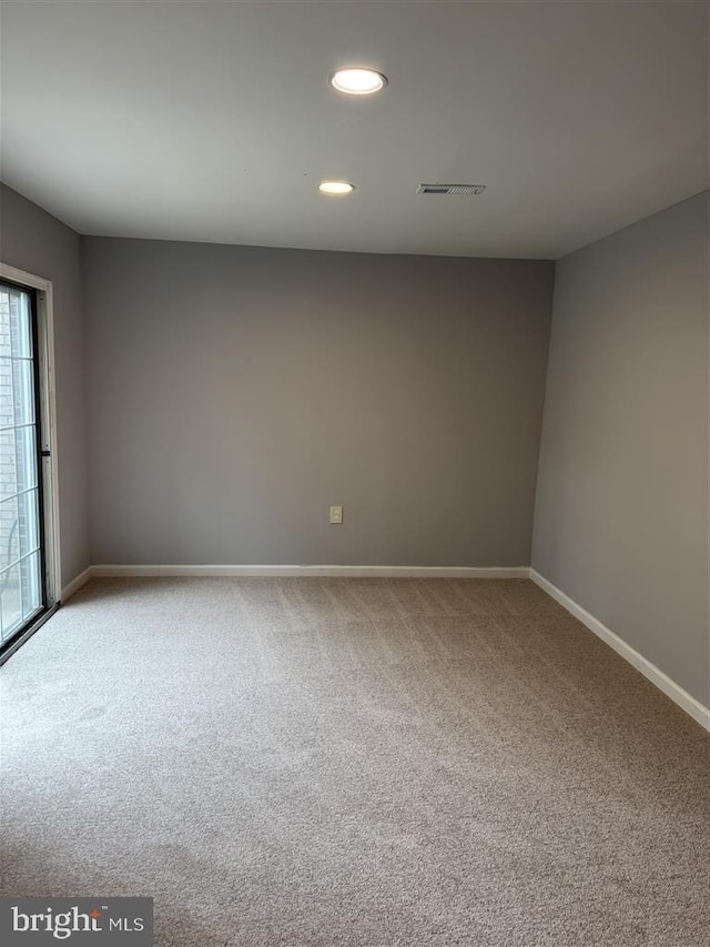 15368 Blacksmith Ter, Woodbridge, VA 22191 - unfurnished room with light colored carpet, baseboards, and recessed lighting