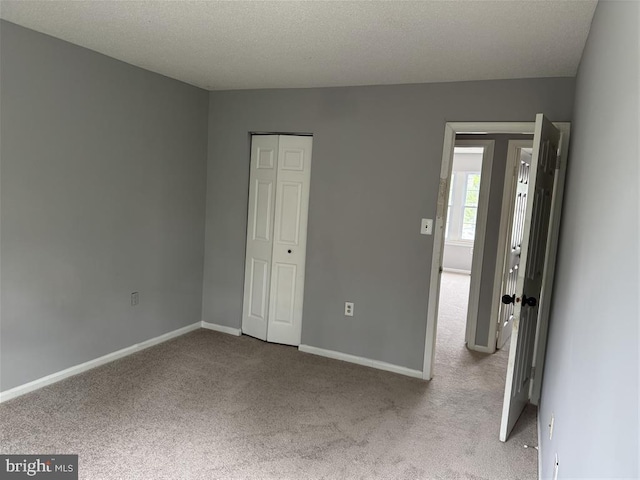 15368 Blacksmith Ter, Woodbridge, VA 22191 - unfurnished bedroom featuring carpet, a closet, and baseboards