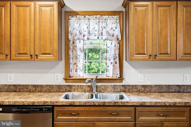 660 Bissetts Ln, Bloomsburg, PA 17815 - kitchen featuring dishwasher, a sink, dark countertops, and brown cabinetry