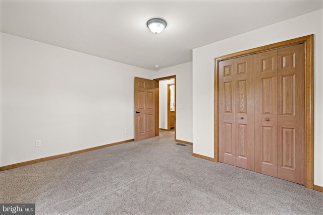 660 Bissetts Ln, Bloomsburg, PA 17815 - unfurnished bedroom with carpet flooring, baseboards, and a closet