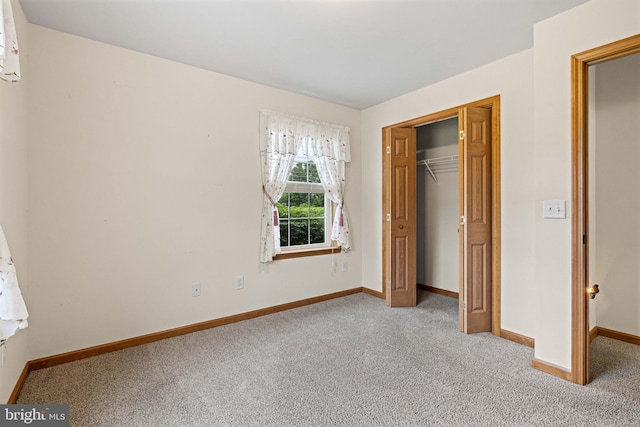 660 Bissetts Ln, Bloomsburg, PA 17815 - unfurnished bedroom featuring carpet, baseboards, and a closet