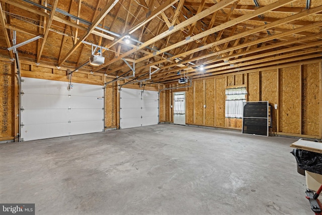 660 Bissetts Ln, Bloomsburg, PA 17815 - garage featuring a garage door opener