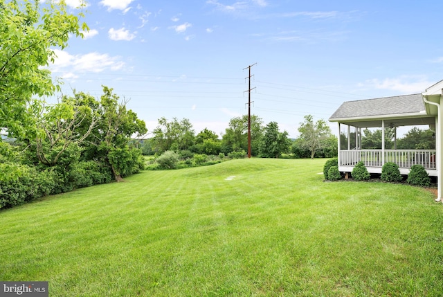 660 Bissetts Ln, Bloomsburg, PA 17815 - view of green lawn with a sunroom