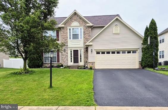 2523 Codorus Ln, Spring Grove, PA 17362 - traditional-style house with stone siding and asphalt driveway