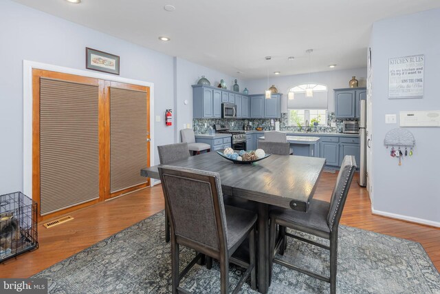 211 Spruce Trl, Woolwich Twp, NJ 08085 - dining room with wood finished floors and recessed lighting