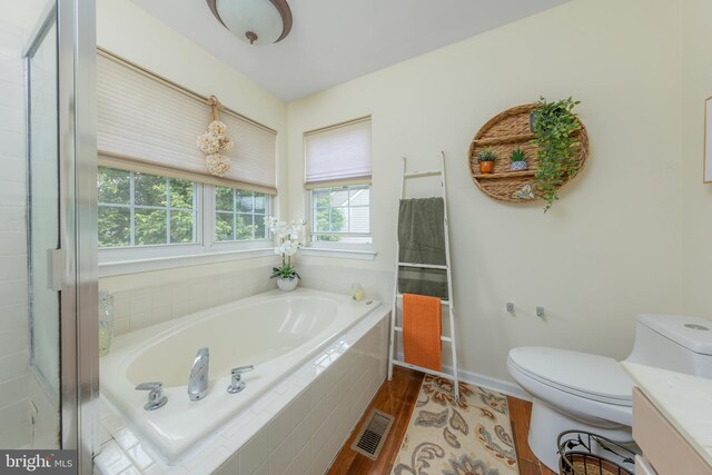 211 Spruce Trl, Woolwich Twp, NJ 08085 - full bath featuring a garden tub, vanity, and wood finished floors