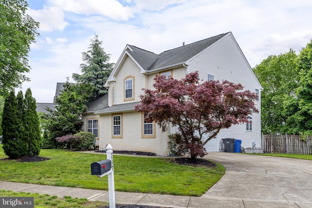 211 Spruce Trl, Woolwich Twp, NJ 08085 - traditional-style house featuring stucco siding and driveway