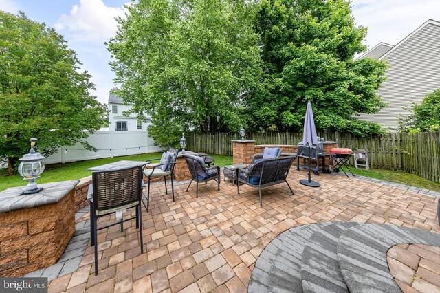 211 Spruce Trl, Woolwich Twp, NJ 08085 - fenced backyard featuring outdoor dining space and a patio