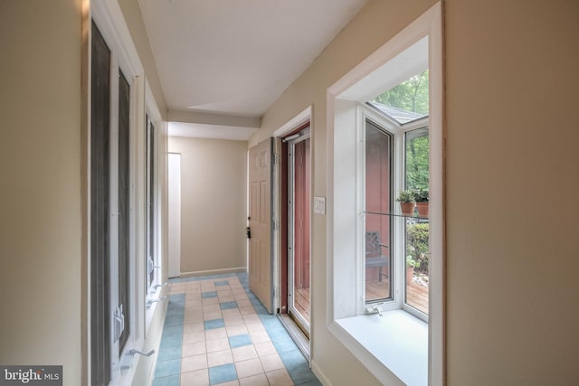 12798 Forest Oak Ct, Manassas, VA 20112 - hall with light tile patterned floors and baseboards