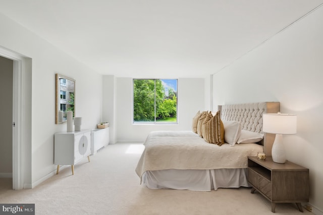 4100 Cathedral Ave NW Unit 709, Washington, DC 20016 - carpeted bedroom featuring multiple windows and baseboards