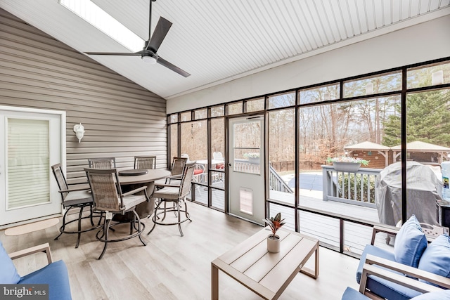 3420 Ponds Wood Ct, Huntingtown, MD 20639 - sunroom featuring vaulted ceiling, a ceiling fan, an outdoor living space, and outdoor dining area