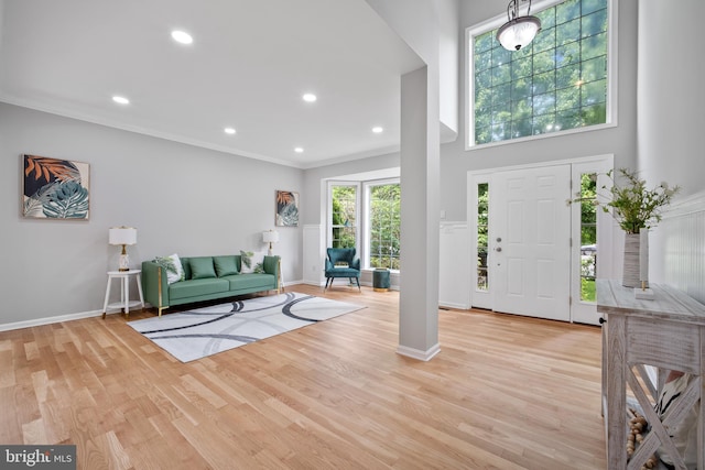 47561 Hidden Cove Ct, Sterling, VA 20165 - entryway with recessed lighting, baseboards, wood finished floors, ornamental molding, and a towering ceiling