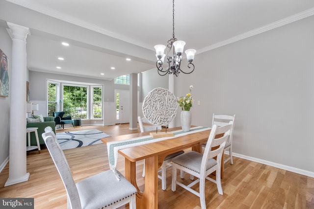47561 Hidden Cove Ct, Sterling, VA 20165 - dining space featuring light wood-type flooring, recessed lighting, ornamental molding, a chandelier, and baseboards
