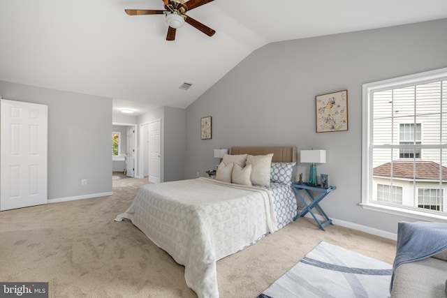 47561 Hidden Cove Ct, Sterling, VA 20165 - bedroom with light colored carpet, vaulted ceiling, baseboards, a closet, and a ceiling fan
