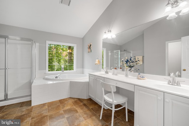 47561 Hidden Cove Ct, Sterling, VA 20165 - full bathroom with lofted ceiling, double vanity, a shower stall, and a bath