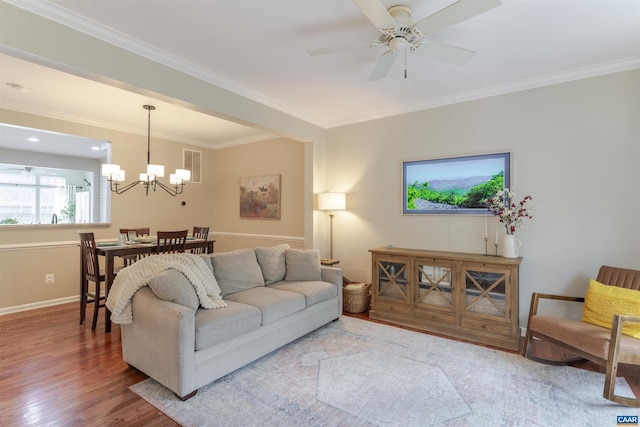 2667 Aldersgate Way, Charlottesville, VA 22911 - living area with wood finished floors, a chandelier, baseboards, ornamental molding, and ceiling fan