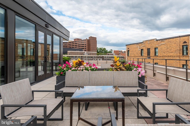 2700 Calvert St NW Unit 812/818, Washington, DC 20008 - view of patio / terrace with an outdoor hangout area, a balcony, and french doors