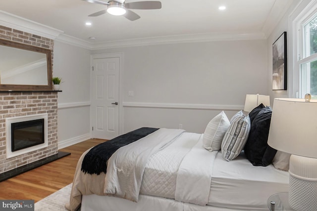 3402 Halloway S, Upper Marlboro, MD 20772 - bedroom featuring wood finished floors, ornamental molding, a fireplace, recessed lighting, and ceiling fan