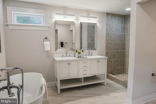 3402 Halloway S, Upper Marlboro, MD 20772 - full bath featuring a freestanding bath, double vanity, marble look tiles, baseboards, and tiled shower