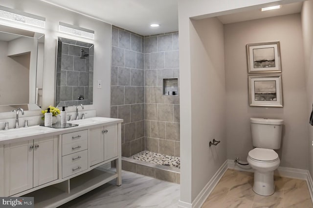 3402 Halloway S, Upper Marlboro, MD 20772 - full bathroom with double vanity, a tile shower, toilet, baseboards, and recessed lighting
