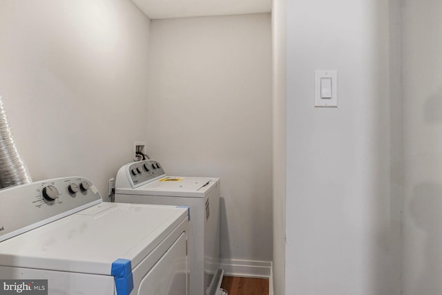 3402 Halloway S, Upper Marlboro, MD 20772 - washroom with independent washer and dryer, baseboards, and wood finished floors