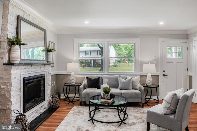 3402 Halloway S, Upper Marlboro, MD 20772 - living room featuring crown molding, wood finished floors, a fireplace, and recessed lighting