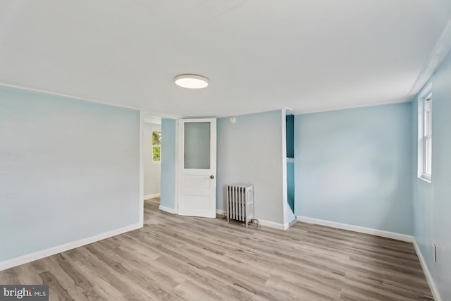 635 Elroy Rd, Souderton, PA 18964 - spare room with radiator, wood finished floors, and baseboards