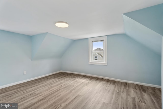 635 Elroy Rd, Souderton, PA 18964 - bonus room featuring wood finished floors, baseboards, and lofted ceiling