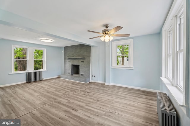 635 Elroy Rd, Souderton, PA 18964 - unfurnished living room with radiator, baseboards, and a ceiling fan