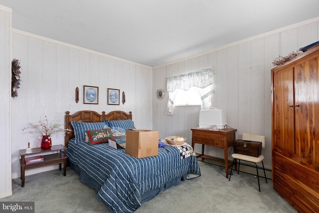 25 Kollman Dr, Newark, DE 19713 - bedroom with carpet floors, wood walls, and crown molding