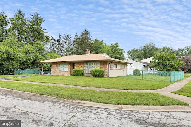 25 Kollman Dr, Newark, DE 19713 - view of front of home featuring a chimney and brick siding