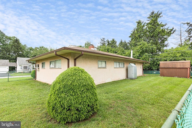 25 Kollman Dr, Newark, DE 19713 - view of property exterior with a chimney and stucco siding